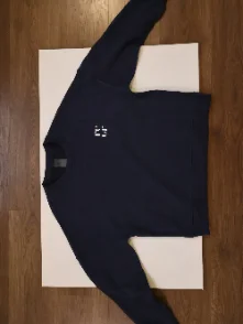 Before — flat-lay garment